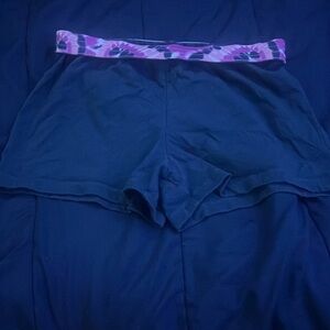 Navy blue shorts with a tye dye waistband